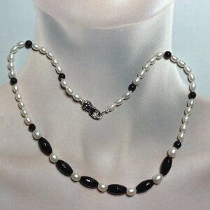Elegant Pearl and Black Bead Necklace